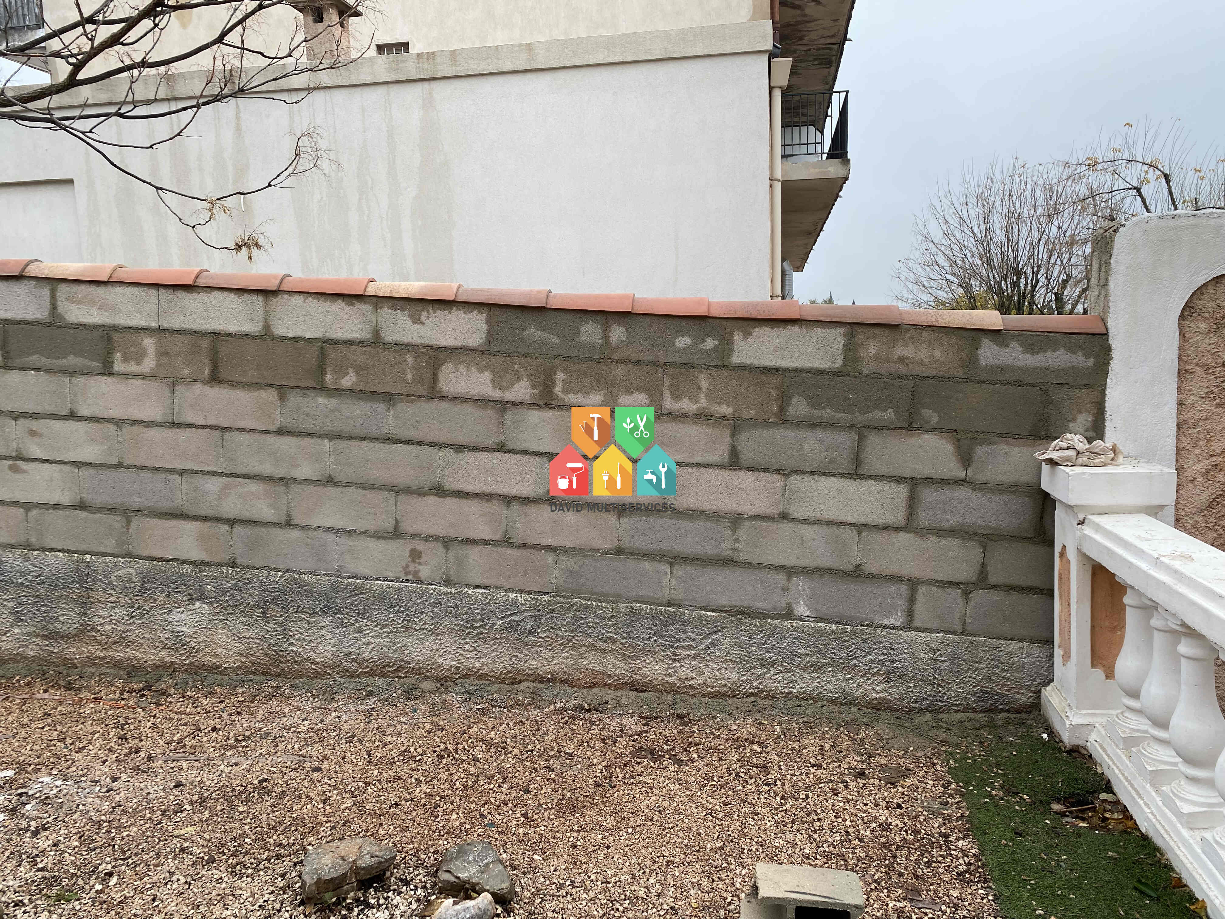 mur en parpaing avant enduit